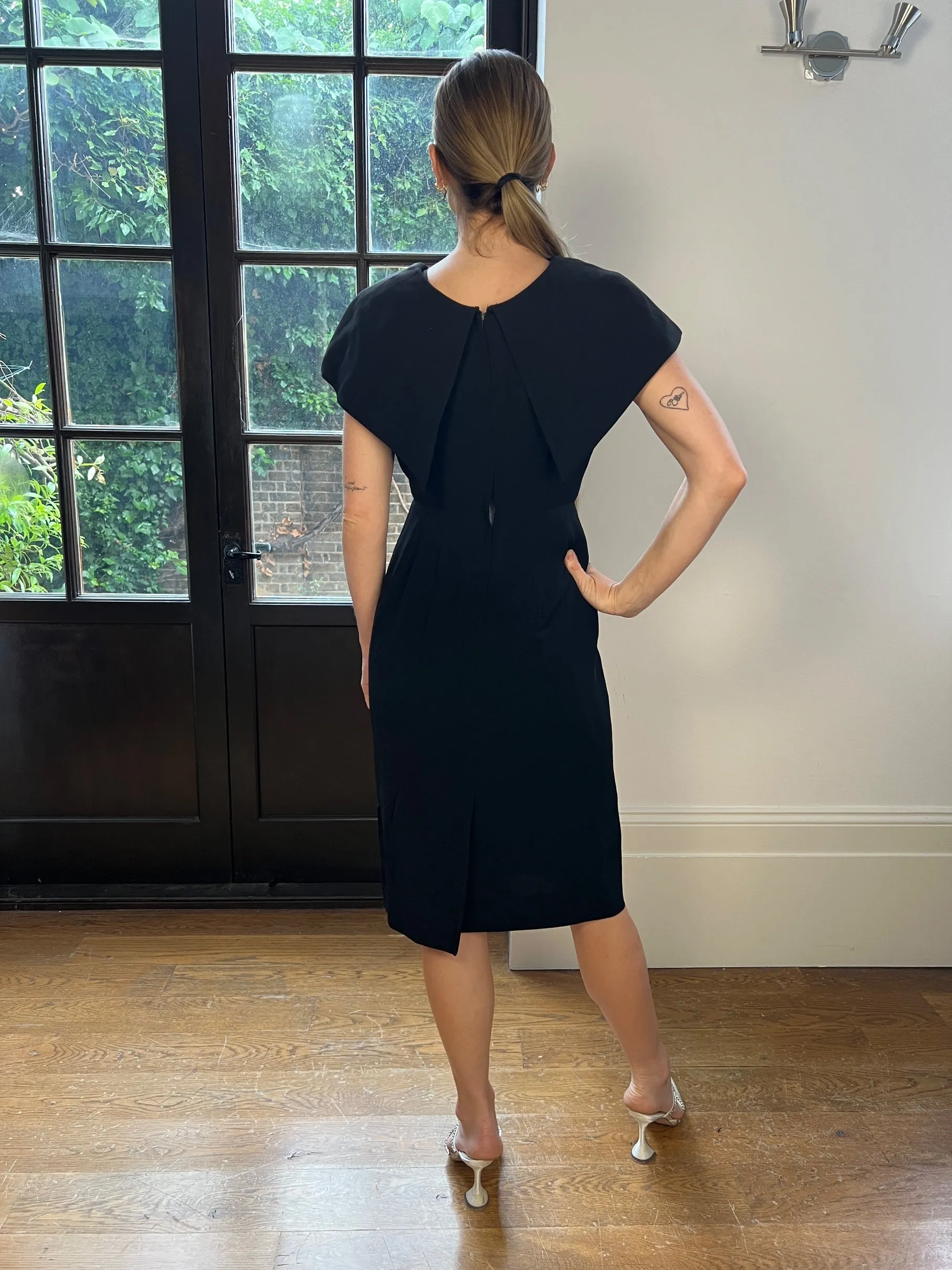 1960s Herman Marcus Black Crepe Dress with Rosettes
